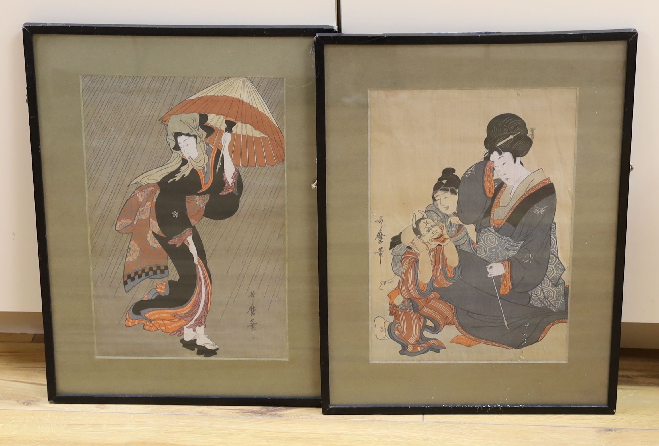 Utamaro (1753-1806), two woodblock prints, Woman with boy wearing a mask and Woman in a rain storm, 36 x 24cm